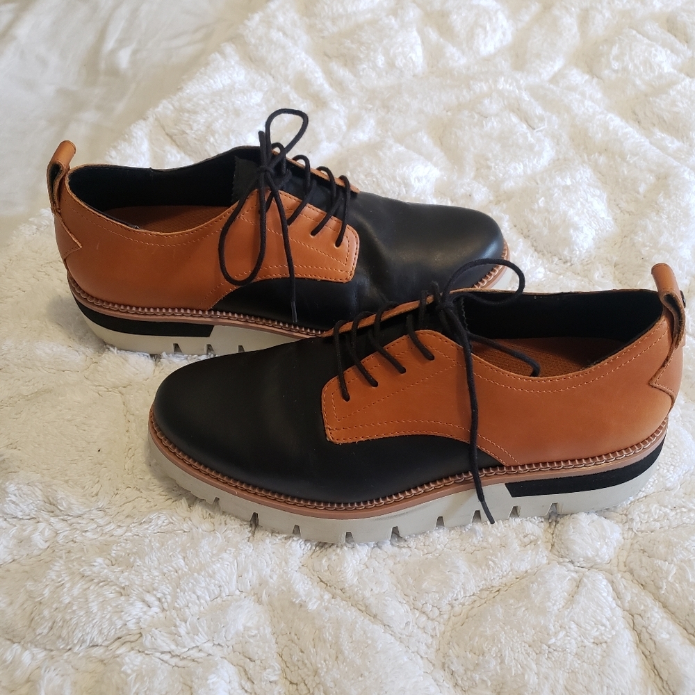CAT BROWN-BLACK LOAFERS...SIZE:7 1/2 W GREAT CONDITION